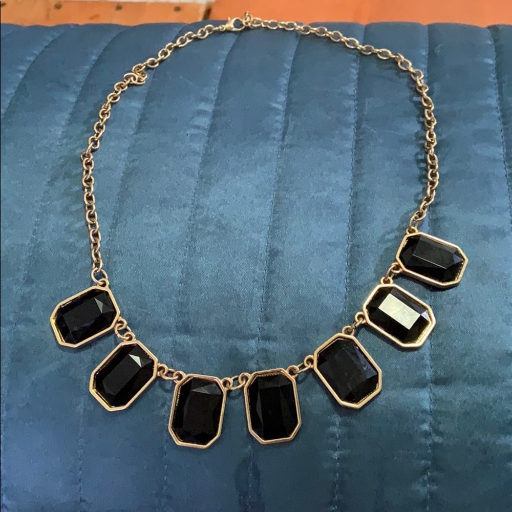 Black and gold costume jewelry necklace